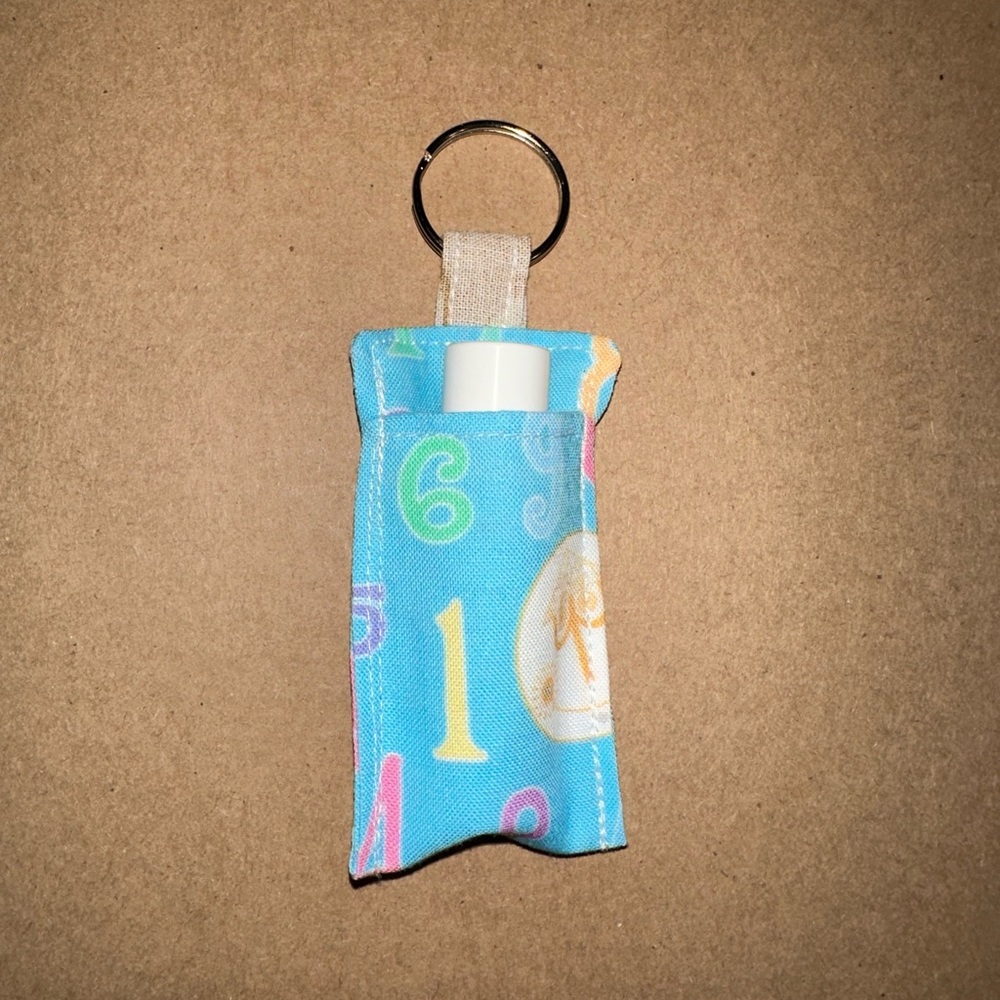 Handmade lip balm holder keychain- It’s a Small World